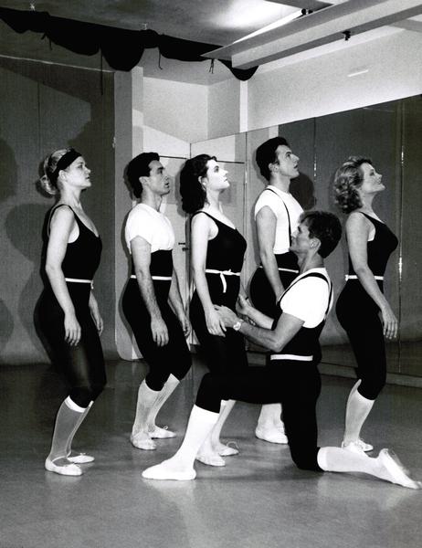 Upward arch and opening the upper body